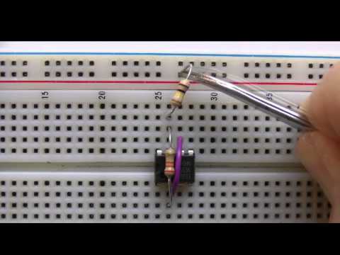 electronics - This video demonstrates constructing a basic circuit with a common integrated circuit/microchip, the 555 timer. This versatile device can be configured to co...