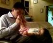 Yung Yung massaging daddy s face with her feet
