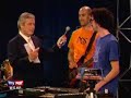 experimental band invisible plays live on local fox news with their homemade instrument, a selectric typewriter that plays keyboard.  unbeknownst to fox, the song is making an anti-fox statement.  look closely at the text typed - it's a little hard to make out, it says 