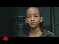 at a press conference for 'the karate kid' in berlin, will smith takes on the role of embarrassing dad to the film's star jaden, by asking him about a kissing scene in the movie. (july 19)
