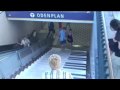 Happy people on piano stairs