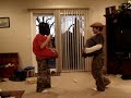 two kids fight abuot what they like with their buritos.