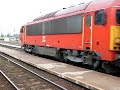 M41-2194 leaves Szerencs with a long nine coach local train from Miskolc - Sátoraljaújhely.
