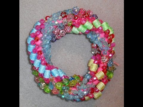 tsummerlee - Chunky triple spiral stitch was done with large plastic beads in a variety of sizes, colors and shapes. Core beads are 8mm plastic pony beads. I used 8lb Fir...