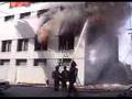Detroit Fire Fighters Battle Fire - bricks almost crush lady