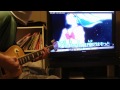 ギターを弾く女