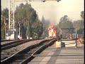 2 BNSF trains Running throught Fullerton(with shy engineer )