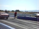 dennis 74 duster 360,and andys 4sp bigblock camaro. racing at yakima race way.