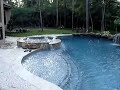 completed pool with waterfall on