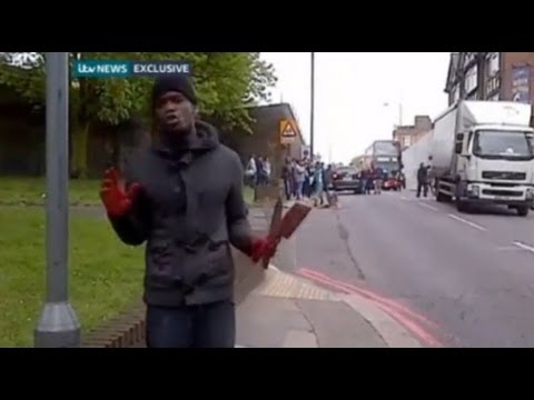 terrorist - More info: http://www.itv.com/news/update/2013-05-22/exclusive-video-man-with-bloodied-hands-speaks-at-woolwich-scene/ http://www.davidpakman.com Become a Me...