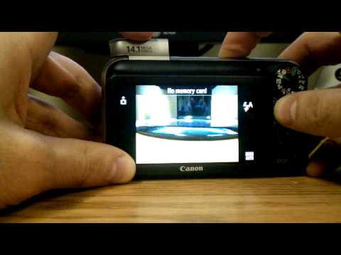 how to set self-timer on canon powershot sx210