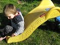 Click here to watch this video Guinea Pig and a Child Play on a Slide
