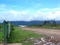 Bush Plane Taking Off on Mud Runway in Guatemala Bush Plane Taking Off on Mud Runway in Guatemala