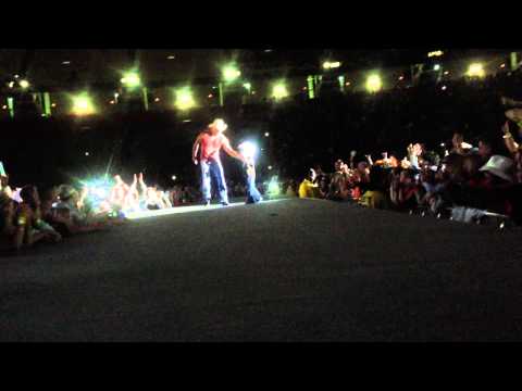 Gives Kid an Autographed Helmet at Concert