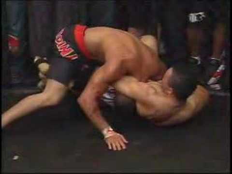 Cornerman Hops In MMA Cage & Beats Up Fighter To Stop Him From Killing Opponent