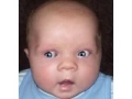 baby laughing at christmas