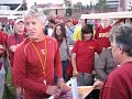 pete carroll addresses the thundering herd after the first practice of 2007 and the presentation of the second touring cart by the thundering herd.