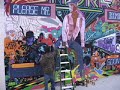 Graffiti artist spray paint mural of The Lady Tigra