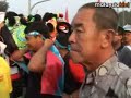 Anwar is escorted by overwhelming numbers