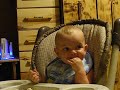 Justin eating his rice crackers