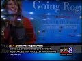 Holding her son in her arms, former Alaska Gov. Sarah Palin stepped off her book tour bus and into the spotlight generated by a best-selling book, a charm offensive, plus local and national media.
