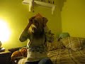Fitting a condom over my head.