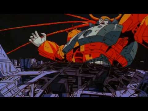 transforms - Unicron transforms, then slams his fist into cybertron.