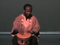 Maxwell Danlogo demonstrates traditional Ghanaian drumming.