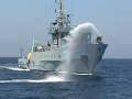 Palestinian Fishermen Resist Water Cannon Assault