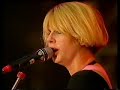 this is the second part of a performance from 12th august 1990. it was from one of a series of concerts to celebrate the 5th birthday of the town & country club (now the forum) in kentish town, north london. this event took place at the alexandra palace, also in north london. the running order for this concert was 29 palms, the 4 of us, voice of the beehive, squeeze and the kinks.

featured tracks are: i'm shooting cupid, beat of love, and say it.