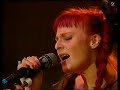 this is the second part of a performance from 12th august 1990. it was from one of a series of concerts to celebrate the 5th birthday of the town & country club (now the forum) in kentish town, north london. this event took place at the alexandra palace, also in north london. the running order for this concert was 29 palms, the 4 of us, voice of the beehive, squeeze and the kinks.

featured tracks are: i'm shooting cupid, beat of love, and say it.