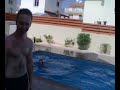 Laura getting pushed in the pool