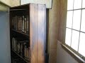 The book shelf leading into the house where Anne Frank lived