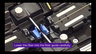 Inserting the fibers into the splicer
