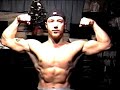 Teen boy flexing