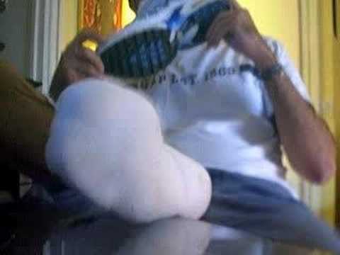 sniffing sweaty stocking feet