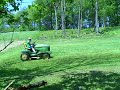 Hughie mowing on john deere
