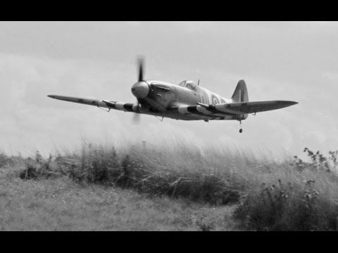 YT - A COMPILATION OF FOUR FLIGHTS DEANO & I HAD WITH OUR ESM / YT INTERNATIONAL MK X1V SPITFIRE DOWN THE PATCH, SHES POWERED BY A DLE 35cc RA (REAR EXHAUST) PETR...