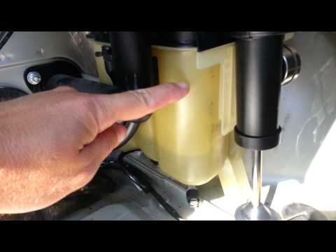 how to drain overflow tank