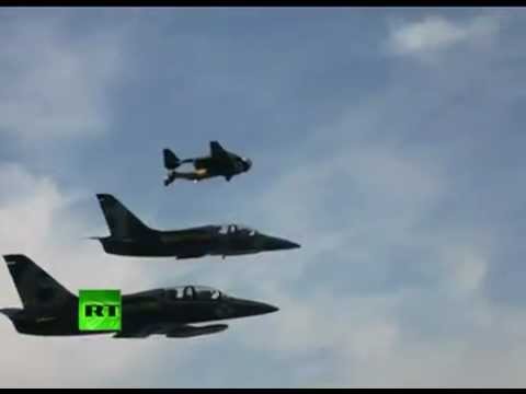 Amazing Video: 'Jet Man' stunts alongside fighter jets over Alps.flv