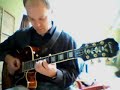 song i wrote and recorded a few years ago, played once more, for the webcam! it's  just a simple groove-latin tune, nice for octave playing.
about the octave playing, i generally use one of three right-hand techniques:
1. with plectrum, advantage is i can easily switch between octave and single note playing.
2. with thumb, montgomery style. nicest sound but sometimes difficult to hit (only) the right strings (for me at least)
3. strumming with index finger like i do here: it sounds a bit harsher, but still ok. advantage is i can use my right thumb to mute low strings and as a 'guide' for hitting the right strings. i can play more accurately in this way. i keep the plectrum between index and middle finger while i do this. changing back to plectrum takes a second (as you can see).