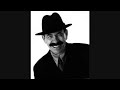 John Paul Larkin (March 13, 1942 December 3, 1999), better known by his stage name Scatman John, was an American jazz musician and singer who created a fusion of scat singing and dance music, best known for his 1994 hit 
