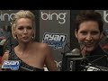 peter facinelli and jennie garth have some fun in the bing box with ryan seacrest as they chat about their experience leading up to the premiere of new moon.