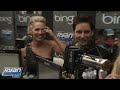 peter facinelli and jennie garth have some fun in the bing box with ryan seacrest as they chat about their experience leading up to the premiere of new moon.