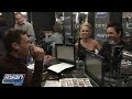 peter facinelli and jennie garth have some fun in the bing box with ryan seacrest as they chat about their experience leading up to the premiere of new moon.