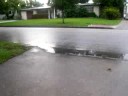 isaac and chase dancing in puddles