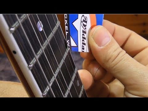 how to adjust acoustic guitar neck