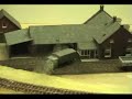 Animated scene on HO-scale model railroad layout.