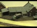 Animated scene on HO-scale model railroad layout.
