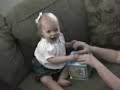 mara kate playing with her jack-in-the-box.